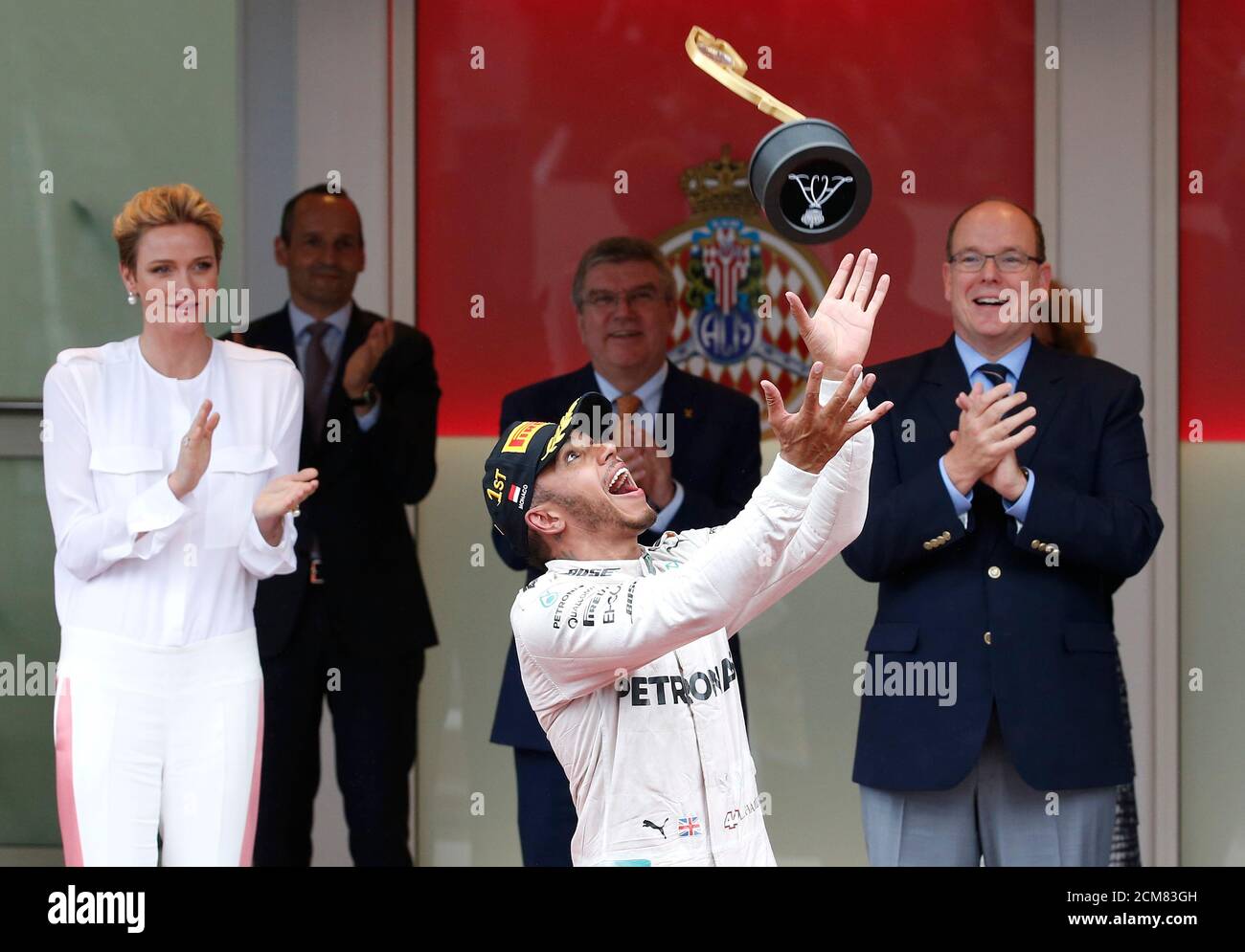 Formula One Monaco Grand Prix Monaco 29 5 16 Mercedes F1 Driver Lewis Hamilton Celebrates After Winning Next To Prince Albert Ii Of Monaco R And Princess Charlene Reuters Eric Gaillard Tpx