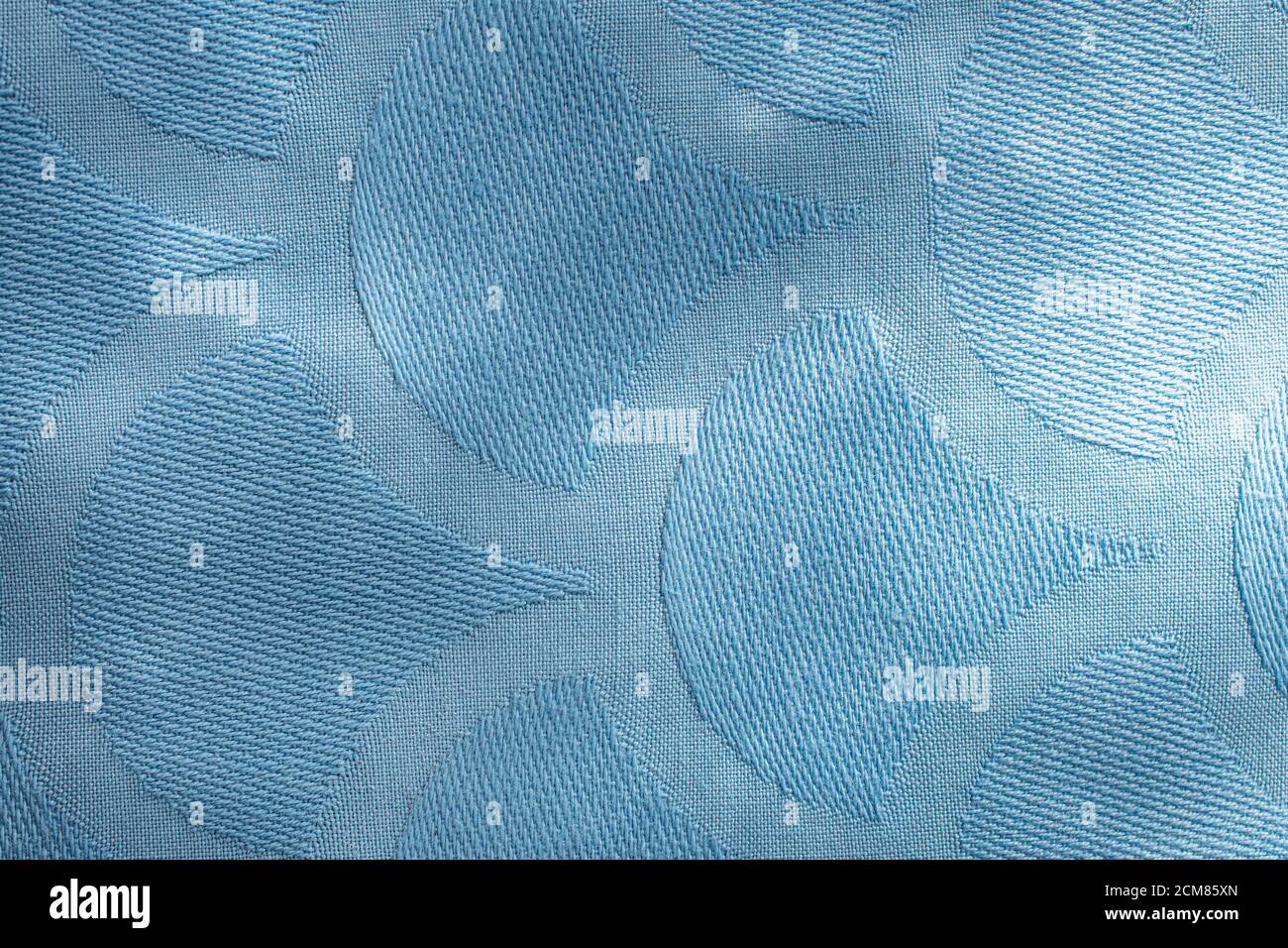 blue fabric texture with sun flare background. Background texture pattern Blue tone fabric Stock Photo