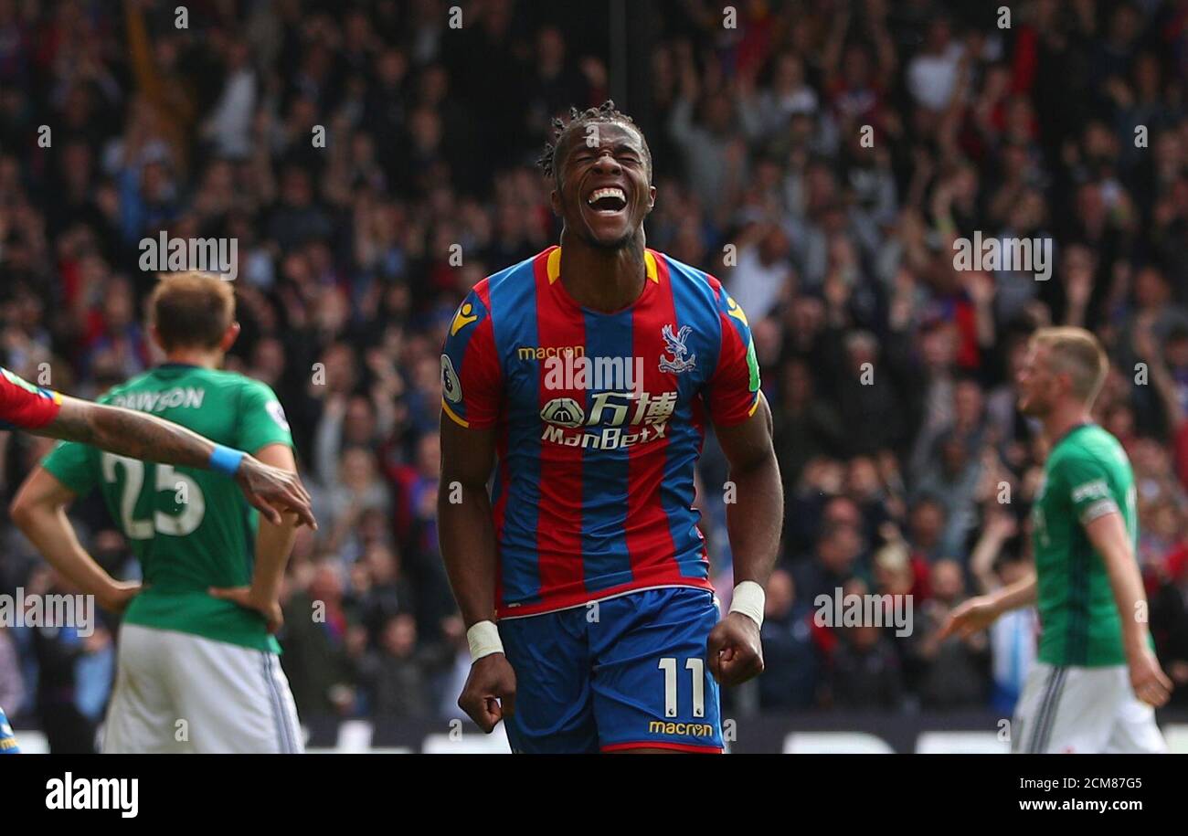 Soccer Football - Premier League - Crystal Palace vs West Bromwich Albion - Selhurst Park, London, Britain - May 13, 2018 Crystal Palace's Wilfried Zaha celebrates scoring their first goal REUTERS/Hannah McKay EDITORIAL USE ONLY. No use with unauthorized audio, video, data, fixture lists, club/league logos or "live" services. Online in-match use limited to 75 images, no video emulation. No use in betting, games or single club/league/player publications. Please contact your account representative for further details. Stock Photo