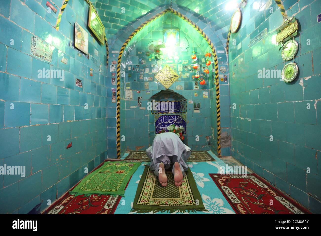 A Man Prays Inside The Shrine Of Imam Mahdi At The Wadi Al Salam Cemetery Arabic For Peace Valley In Najaf South Of Baghdad Iraq August 1 2016 Reuters Alaa Al Marjani Search Iraq Cemetery