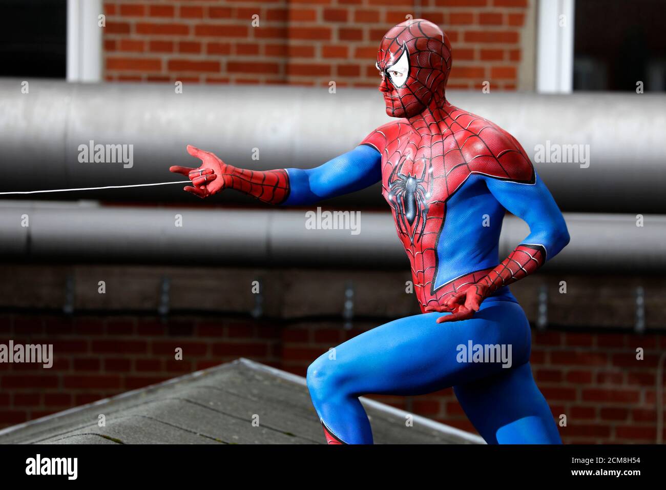 GEEK ART - Bodypainting and Transformaking: Spider-Man photoshooting with Patrick Kiel at the Hefehof in Hamelin on September 15, 2020 - A project by the photographer Tschiponnique Skupin and the bodypainter Enrico Lein Stock Photo