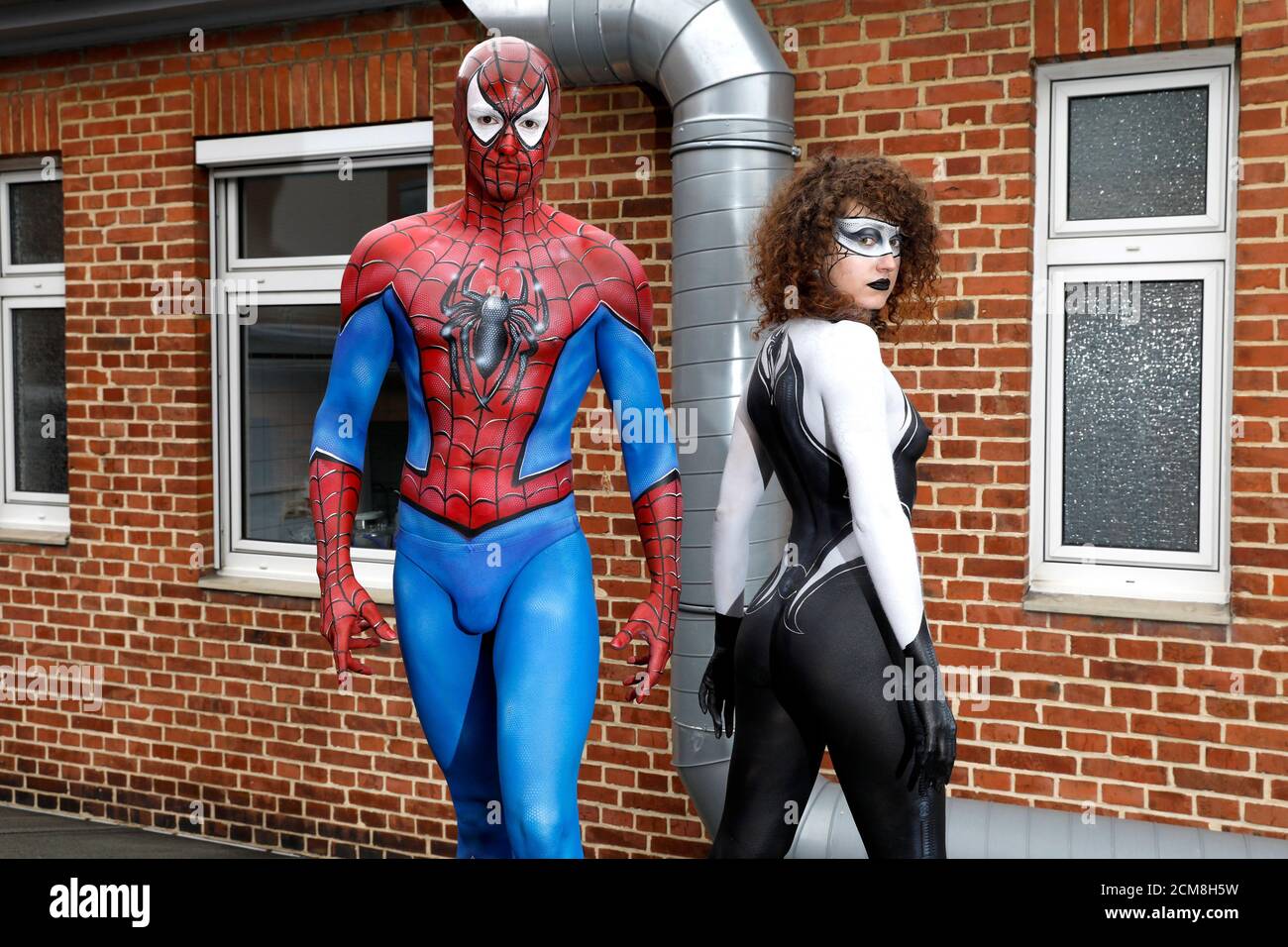 GEEK ART - Bodypainting and Transformaking: Spider-Man and Spider-Gwen photoshooting with Patrick Kiel and Lena Kiel at the Hefehof in Hamelin on September 15, 2020 - A project by the photographer Tschiponnique Skupin and the bodypainter Enrico Lein Stock Photo