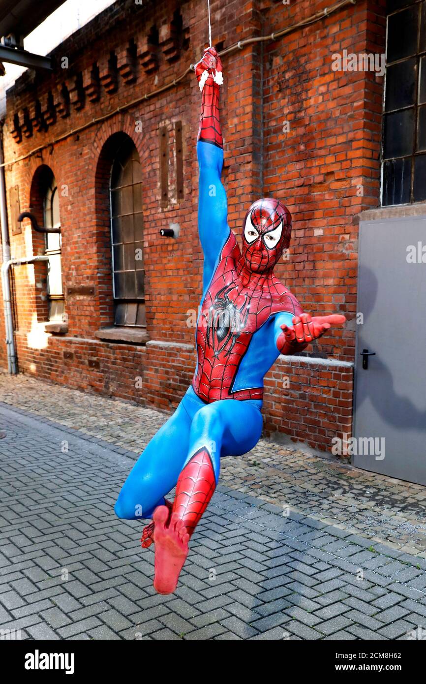 GEEK ART - Bodypainting and Transformaking: Spider-Man photoshooting with Patrick Kiel at the Hefehof in Hamelin on September 15, 2020 - A project by the photographer Tschiponnique Skupin and the bodypainter Enrico Lein Stock Photo