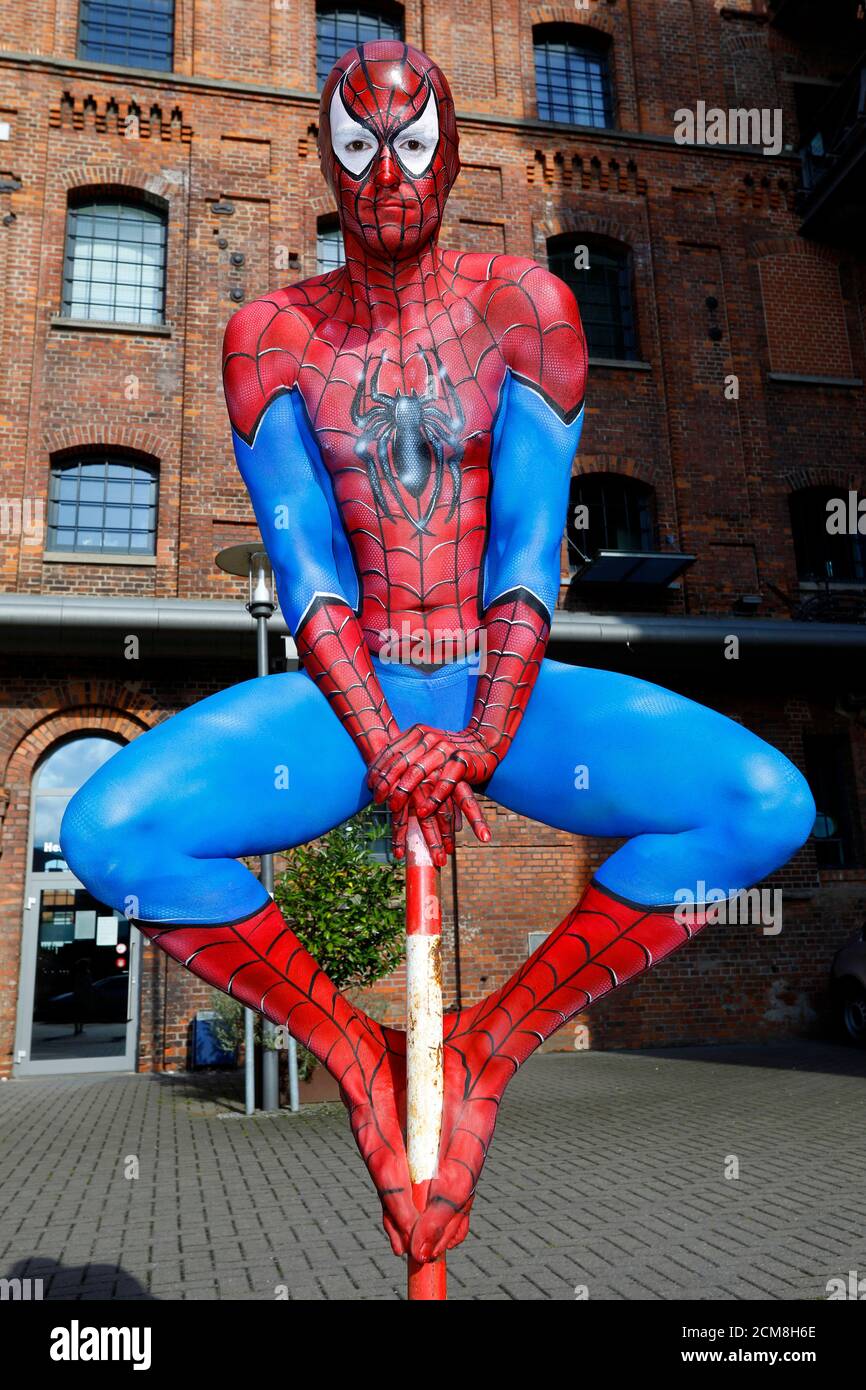 GEEK ART - Bodypainting and Transformaking: Spider-Man photoshooting with Patrick Kiel at the Hefehof in Hamelin on September 15, 2020 - A project by the photographer Tschiponnique Skupin and the bodypainter Enrico Lein Stock Photo