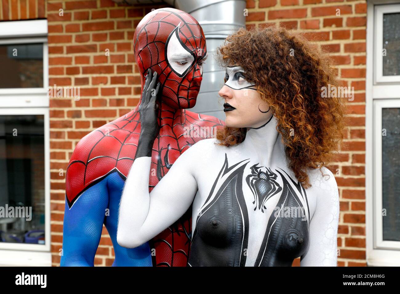 GEEK ART - Bodypainting and Transformaking: Spider-Man and Spider-Gwen photoshooting with Patrick Kiel and Lena Kiel at the Hefehof in Hamelin on September 15, 2020 - A project by the photographer Tschiponnique Skupin and the bodypainter Enrico Lein Stock Photo