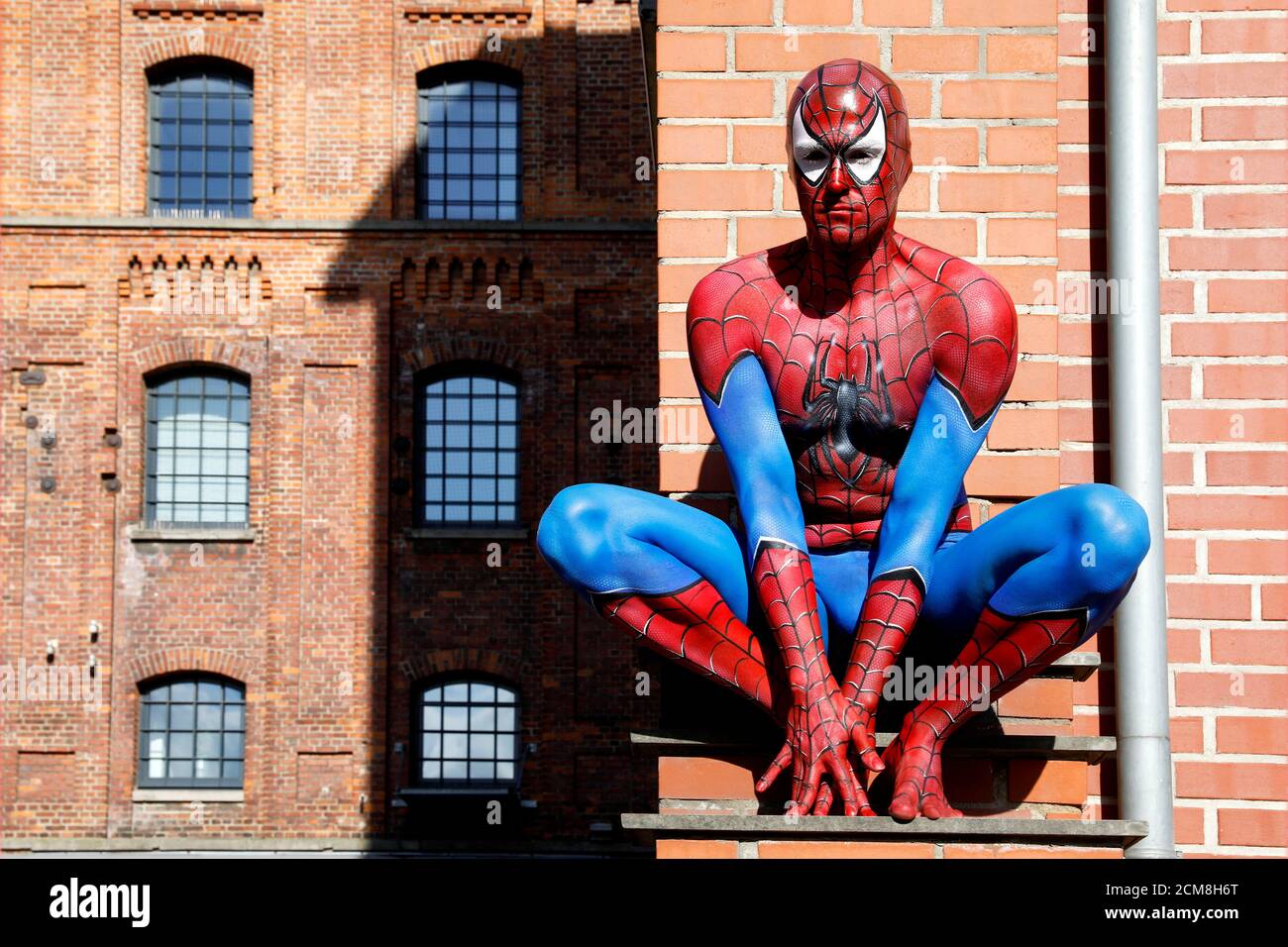 GEEK ART - Bodypainting and Transformaking: Spider-Man photoshooting with Patrick Kiel at the Hefehof in Hamelin on September 15, 2020 - A project by the photographer Tschiponnique Skupin and the bodypainter Enrico Lein Stock Photo