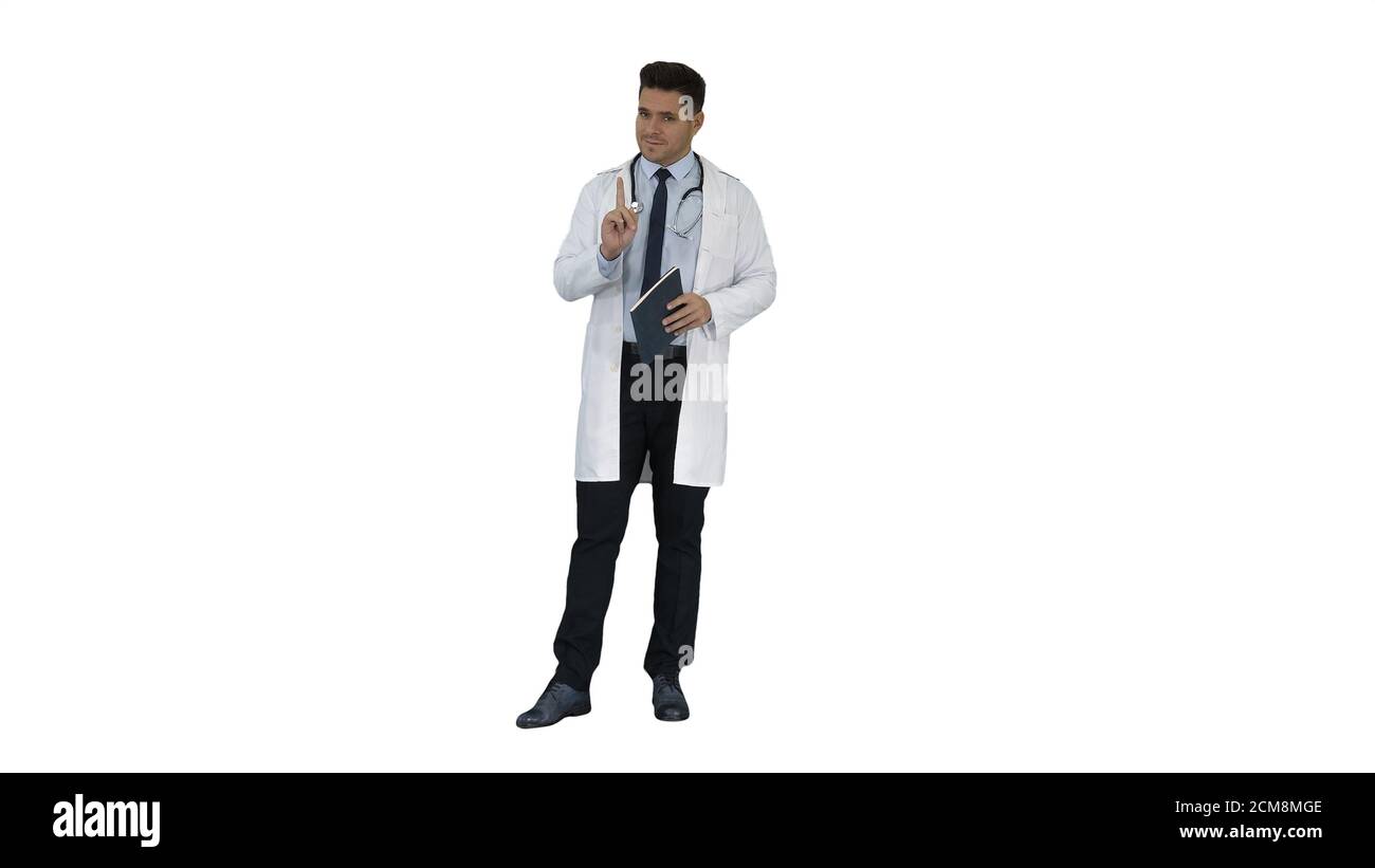 Doctor reading Medical Report of Patient or Recepie or Text book on white background. Stock Photo