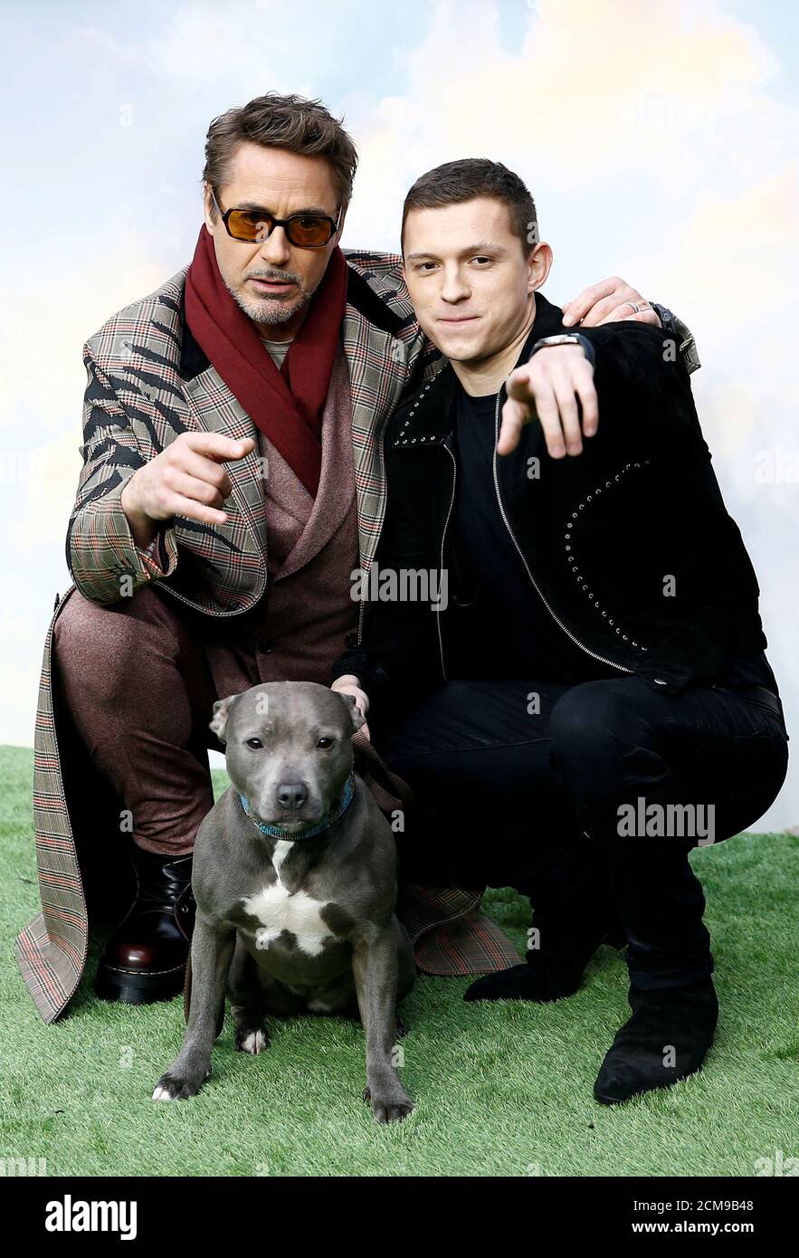 Cast members Robert Downey Jr. and Tom Holland pose at a special screening  of 