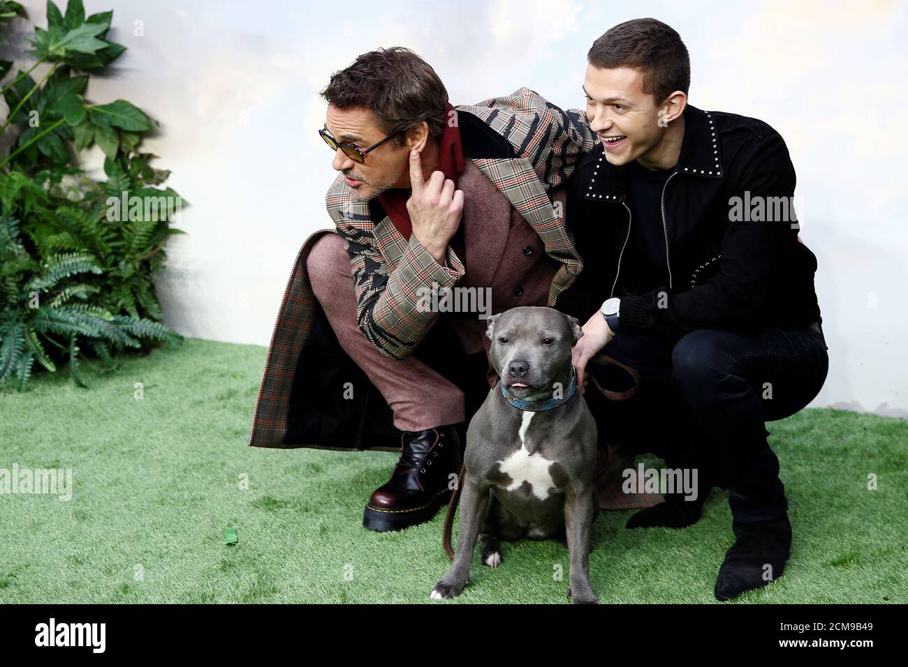 Cast member Robert Downey Jr. and Tom Holland pose at a special screening  of 