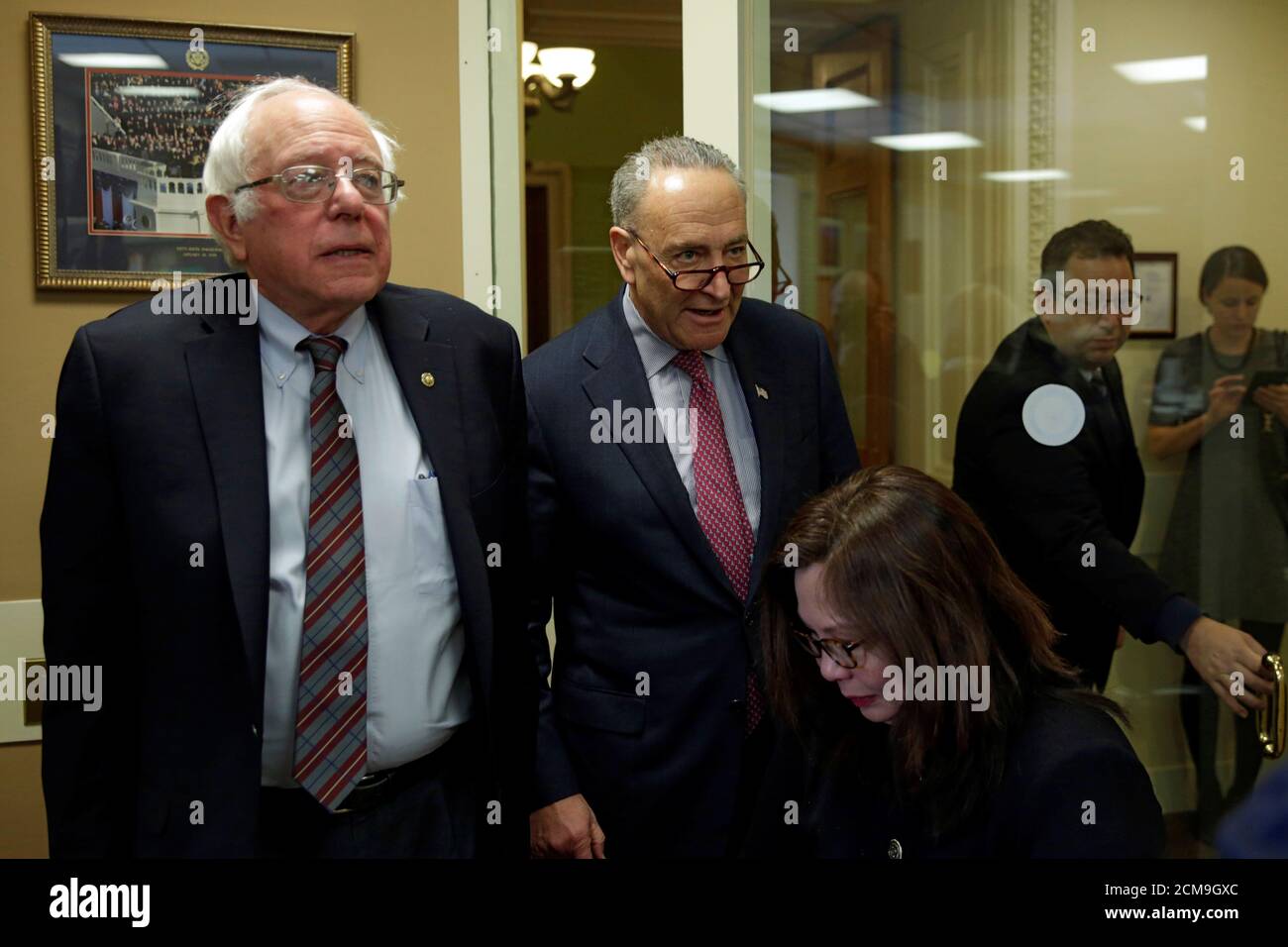 Senate Minority Leader Chuck Schumer D Ny And Senator Bernie Sanders I Vt L Arrive At