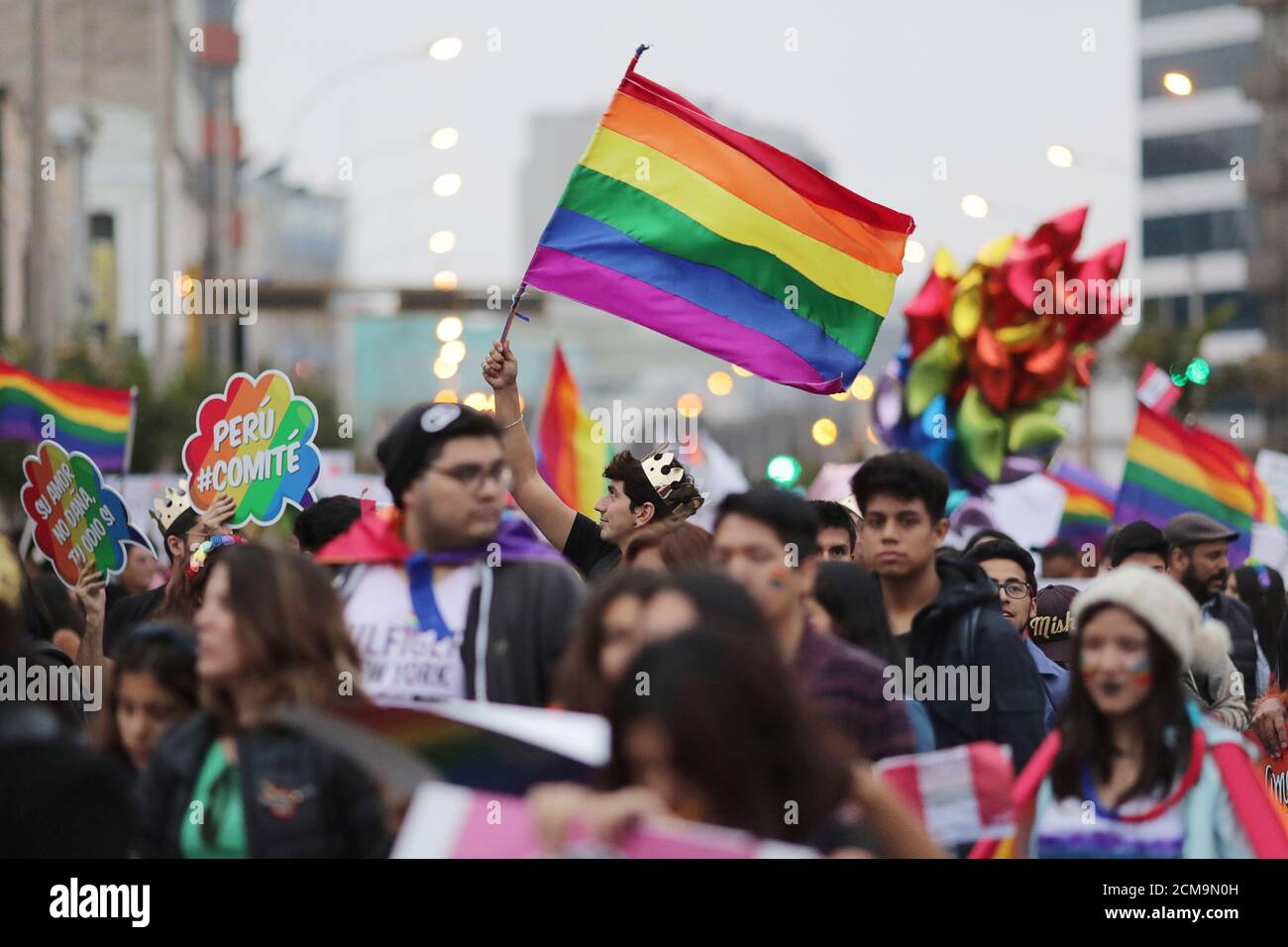 Participants take part in the gay pride parade in Lima, Peru June 29, 2019. REUTERS/Guadalupe Pardo Stock Photo