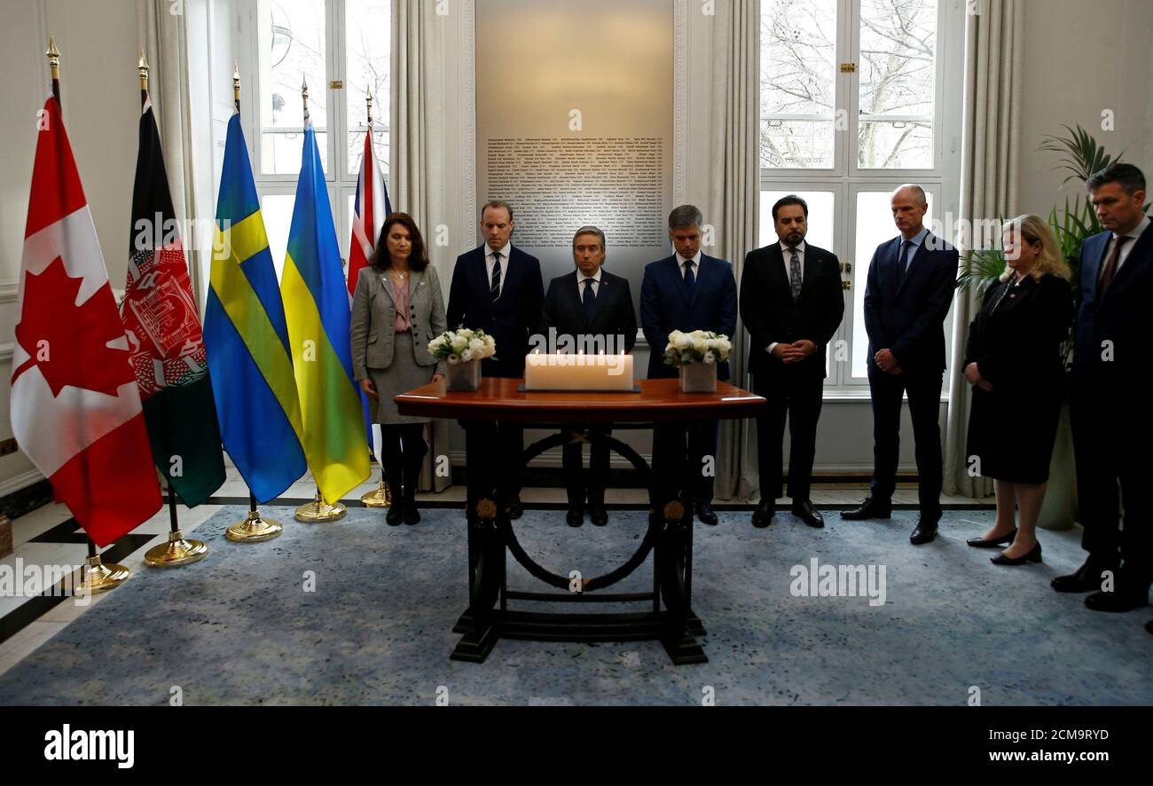 Canada's Minister of Foreign Affairs Francois-Philippe Champagne, Sweden's Foreign Minister Ann Linde, Ukraine's Foreign Minister Vadym Prystaiko, Britain's Foreign Secretary Dominic Raab and Afghanistan's acting Foreign Minister Idrees Zaman hold a moment of silence ahead of a meeting of the International Coordination and Response Group for the families of the victims of the Ukraine International flight which crashed in Iran, at the High Commission of Canada in London, Britain January 16, 2020.     REUTERS/Henry Nicholls Stock Photo