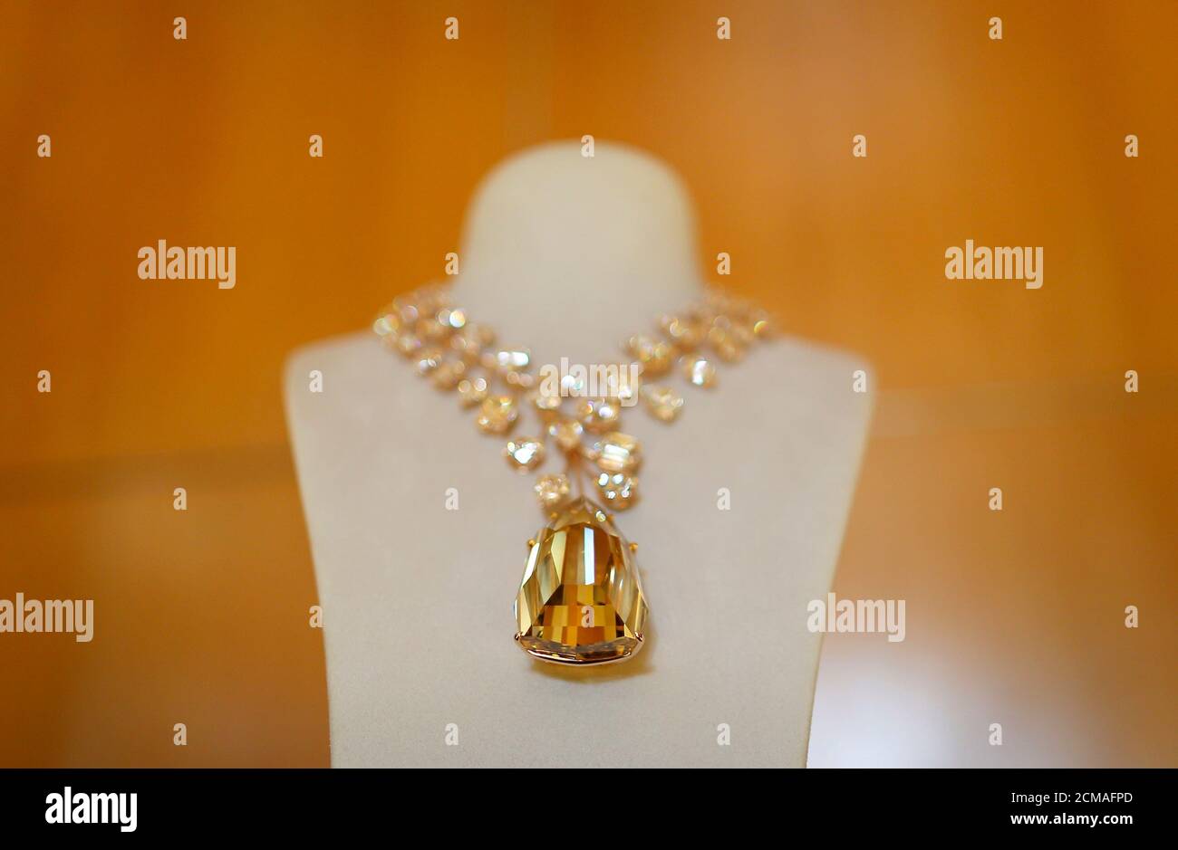A rose gold necklace with a 407 carat 