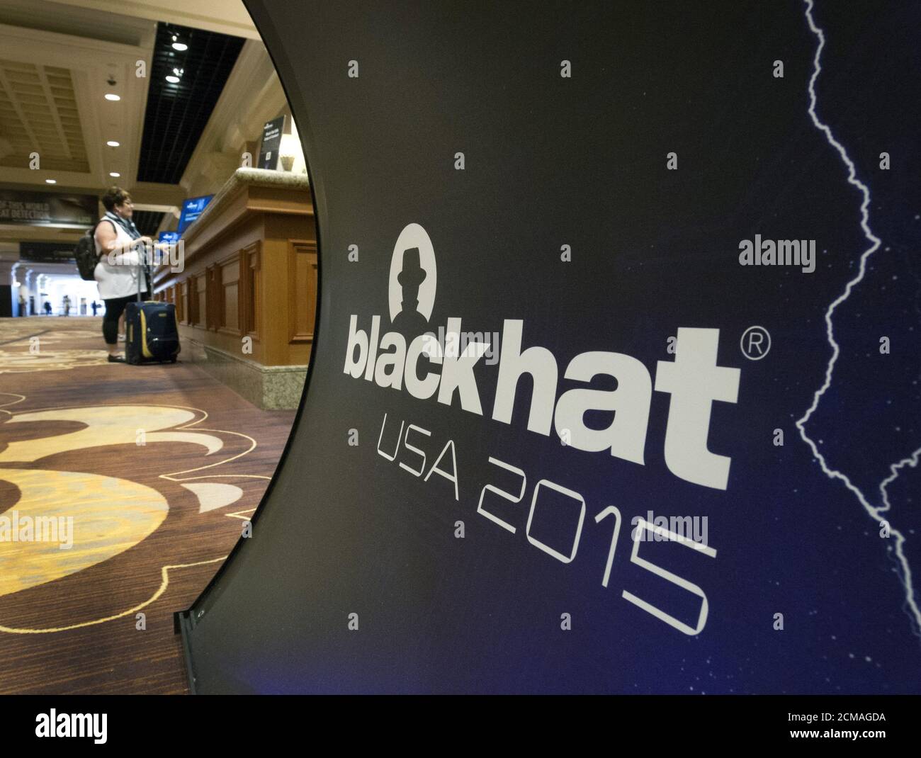 A woman checks in at a sponsor desk during the Black Hat USA 2015 cyber security conference in Las Vegas, Nevada August 4, 2015. REUTERS/ STEVE MARCUS Stock Photo