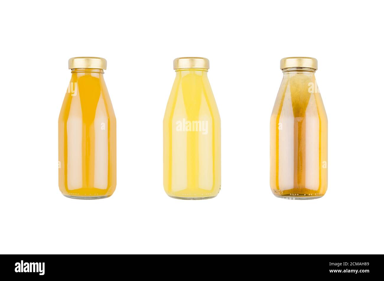 Summer fruits juices orange juice, mango, apple in glass bottles