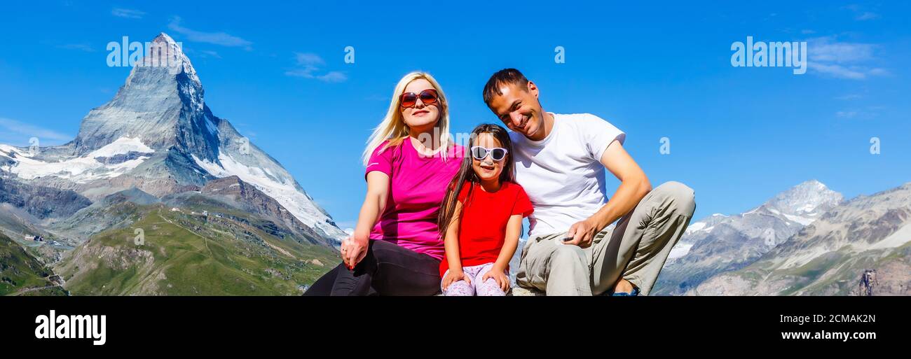 Active family hiking in high alpine region in alps Stock Photo - Alamy