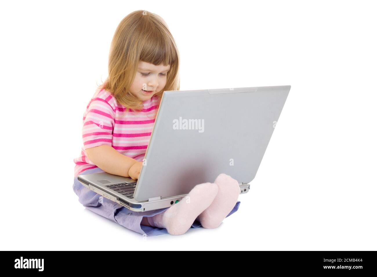 Little smiling girl with laptop isolated Stock Photo - Alamy