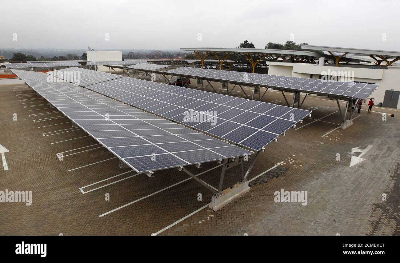 Solar panels are pictured at a solar carport at the Garden City shopping mall in Kenya's capital Nairobi, September 15, 2015. The Africa's largest solar carport with 3,300 solar panels will generate 1256 MWh annually and cut carbon emission by around 745 tonnes per year, according to Solarcentury and Solar Africa.  REUTERS/Thomas Mukoya Stock Photo