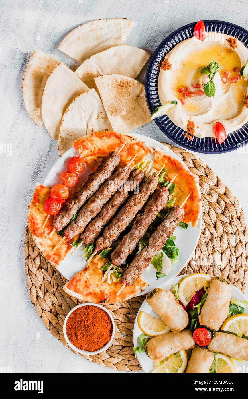 Kebab meat and moutabal (eggplant hummus) with pita bread Stock Photo