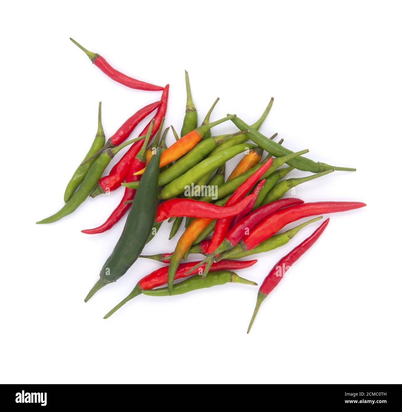 Red and green chili peppers on a white background Stock Photo - Alamy