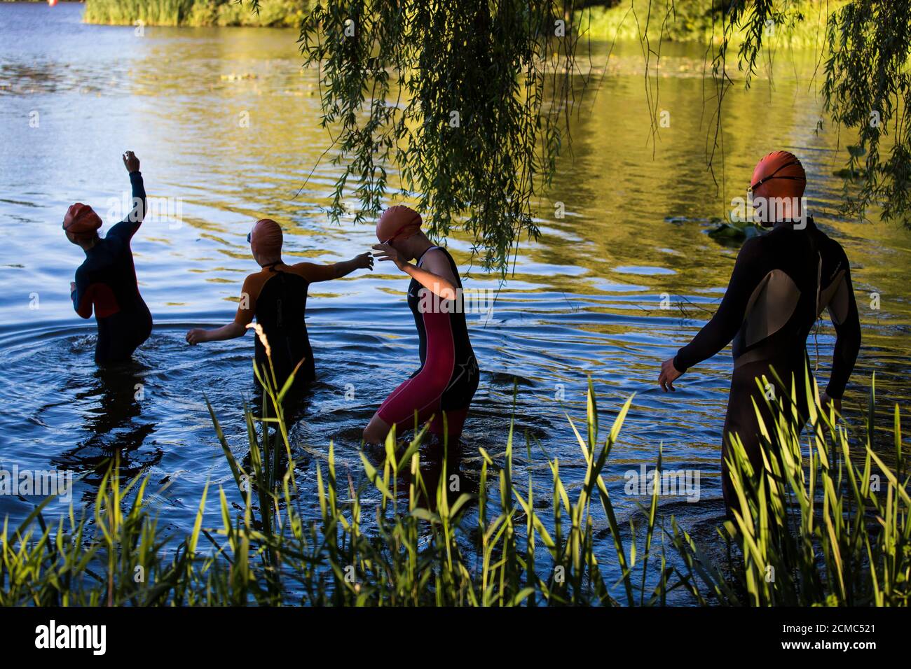 Open water swimming at Hever Castle lake, Kent Stock Photo
