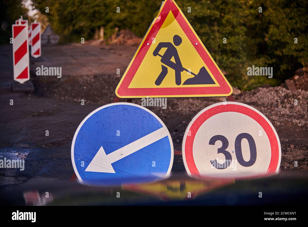 Repairs on the asphalt road, road signs, view from the car Stock Photo ...