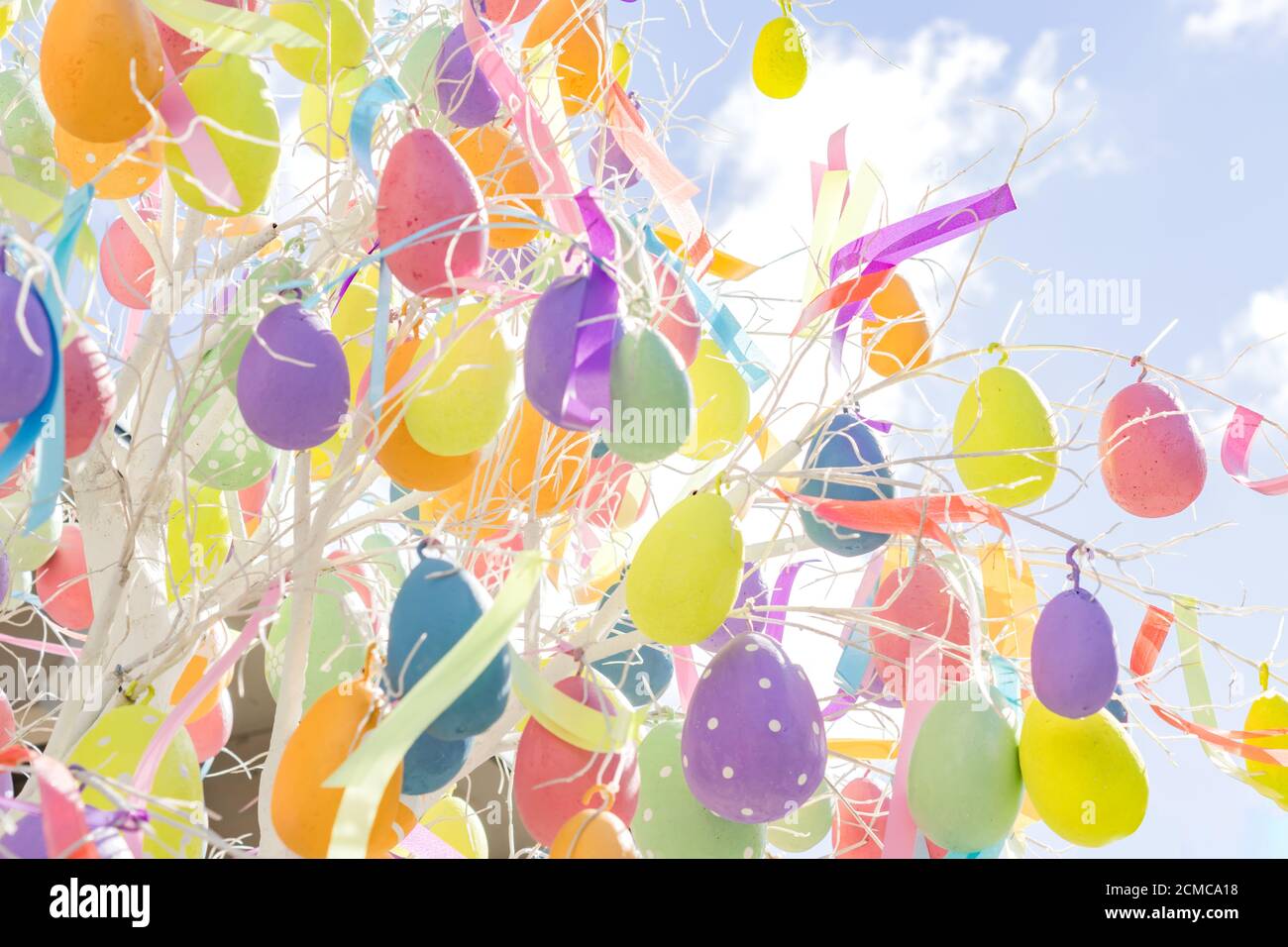 colorfull easter egg tree. brights eggs hanging from branches. Stock Photo