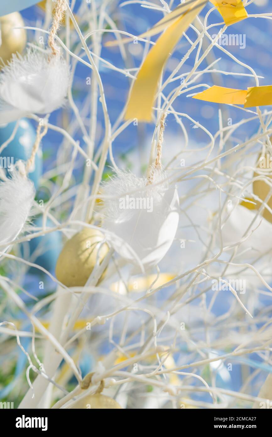 colorfull easter egg tree. brights eggs hanging from branches. Stock Photo