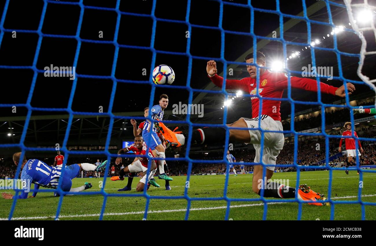Soccer Football - Premier League - Brighton & Hove Albion v Manchester United - The American Express Community Stadium, Brighton, Britain - May 4, 2018   Brighton's Pascal Gross scores their first goal after the attempted clearance from Manchester United's Marcos Rojo is confirmed as being over the line by goal line technology   Action Images via Reuters/Paul Childs    EDITORIAL USE ONLY. No use with unauthorized audio, video, data, fixture lists, club/league logos or 'live' services. Online in-match use limited to 75 images, no video emulation. No use in betting, games or single club/league/p Stock Photo