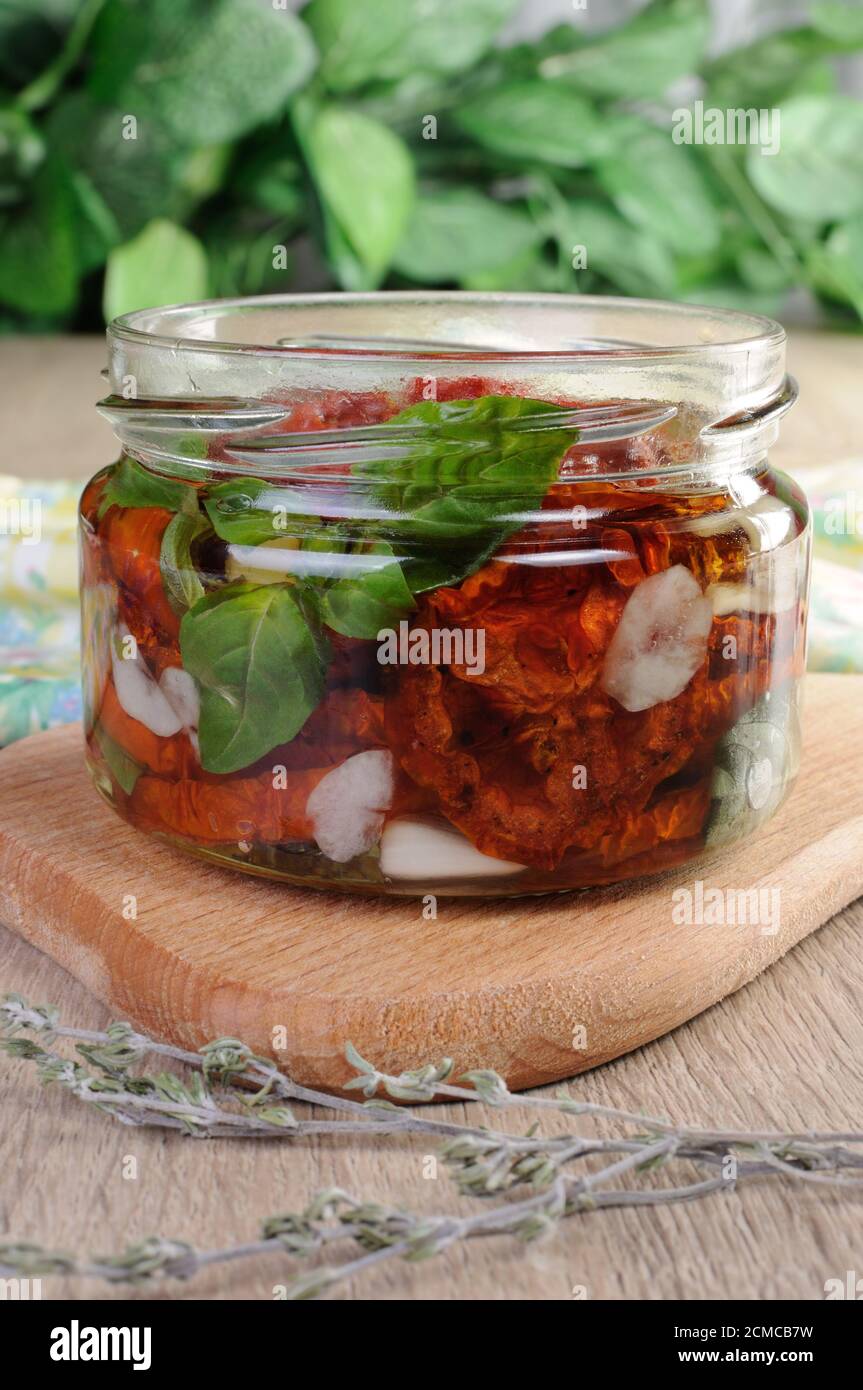 Sundried tomatoes in the bank Stock Photo Alamy