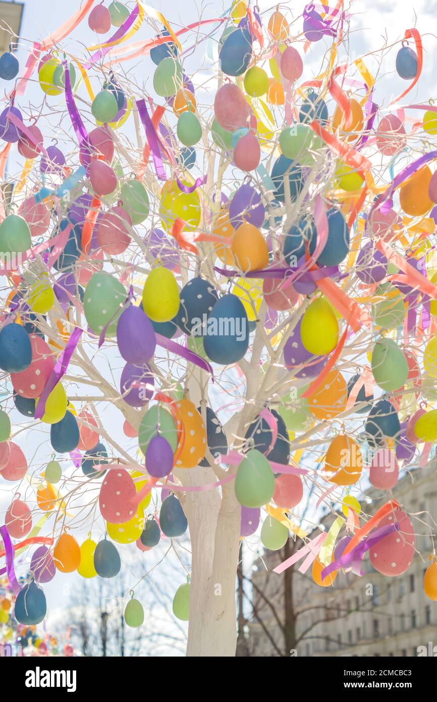 colorfull easter egg tree. brights eggs hanging from branches. Stock Photo