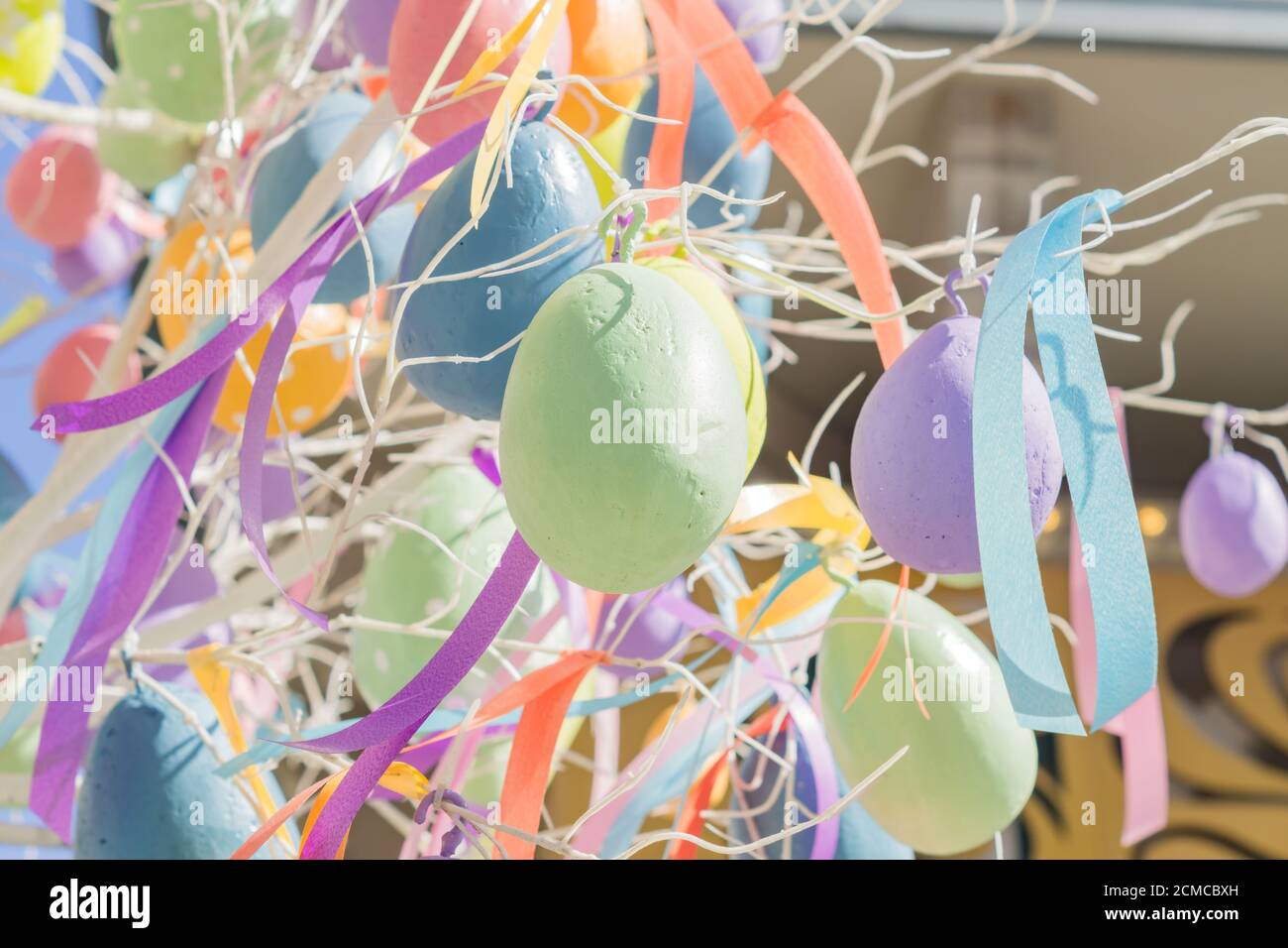 colorfull easter egg tree. brights eggs hanging from branches. Stock Photo