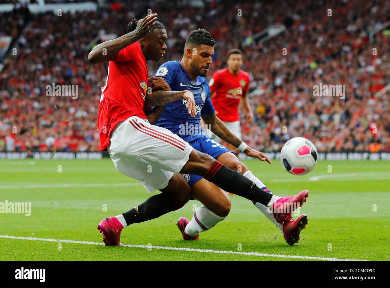 Soccer Football - Premier League - Manchester United v Chelsea - Old Trafford, Manchester, Britain - August 11, 2019  Manchester United's Aaron Wan-Bissaka in action with Chelsea's Emerson Palmieri   REUTERS/Phil Noble  EDITORIAL USE ONLY. No use with unauthorized audio, video, data, fixture lists, club/league logos or 'live' services. Online in-match use limited to 75 images, no video emulation. No use in betting, games or single club/league/player publications.  Please contact your account representative for further details. Stock Photo