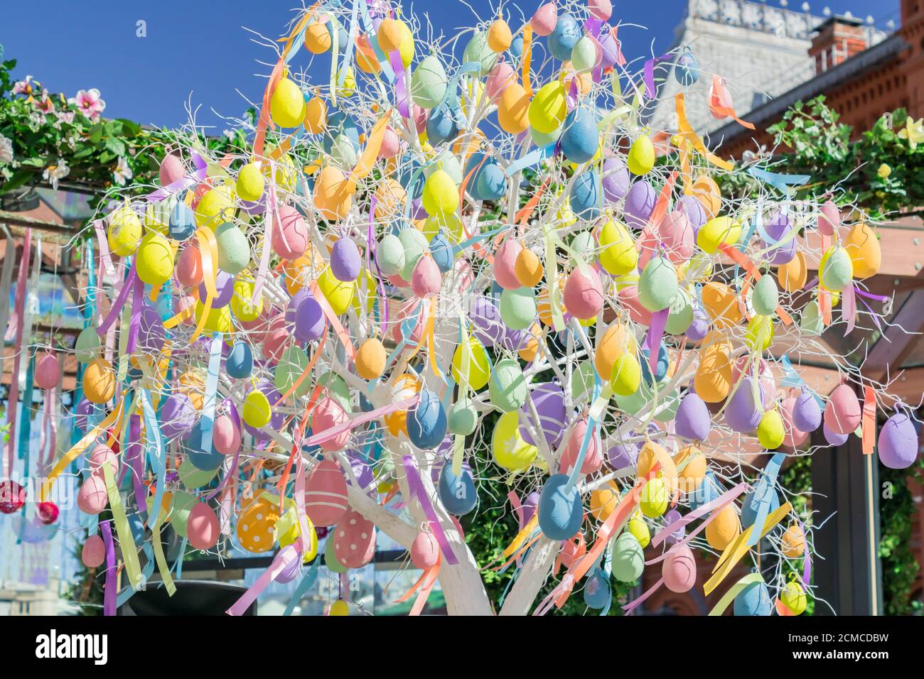 colorfull easter egg tree. brights eggs hanging from branches. Stock Photo