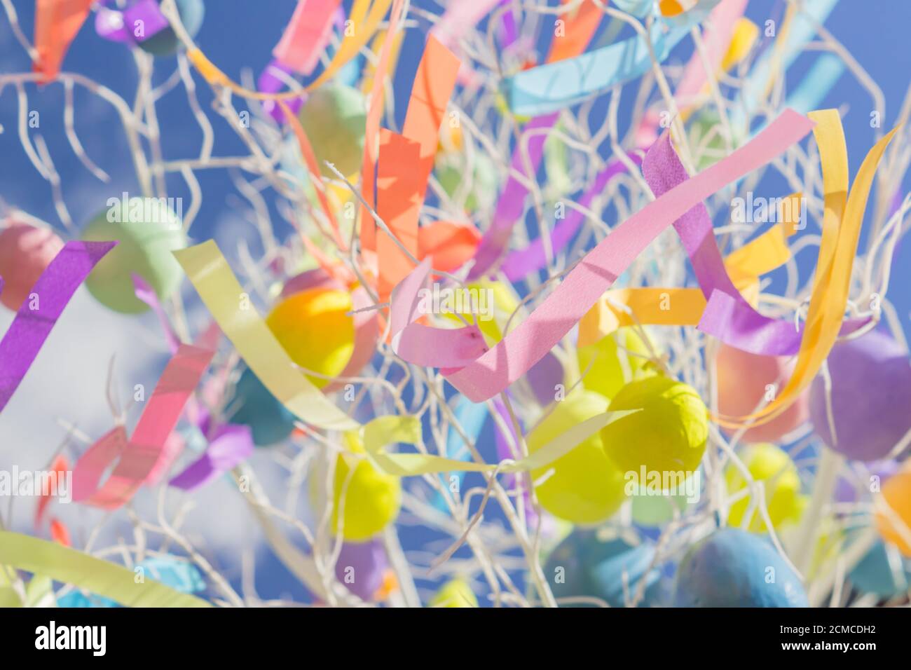 colorfull easter egg tree. brights eggs hanging from branches. Stock Photo
