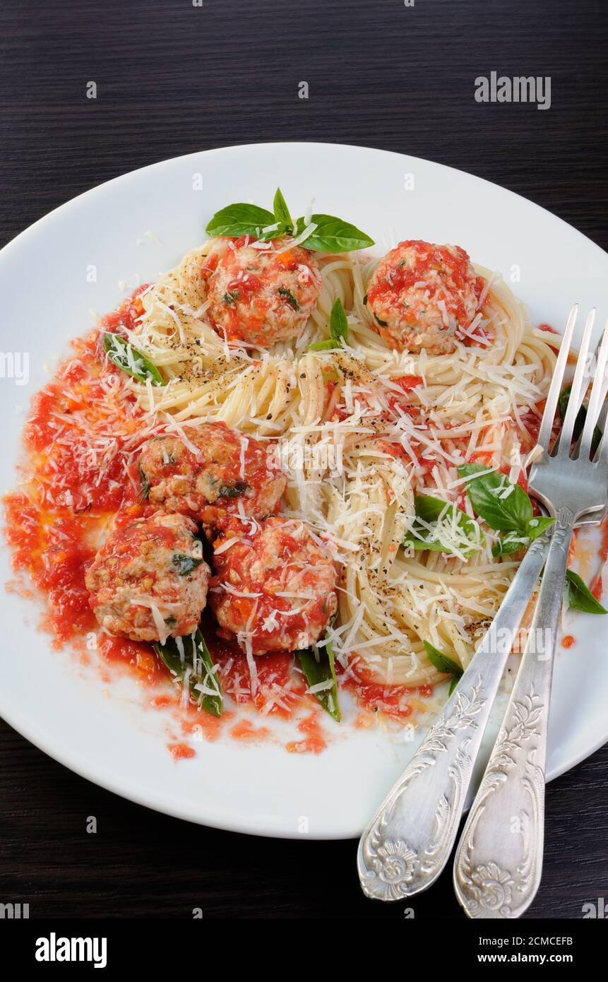Pasta in tomato gravy with meatballs Stock Photo Alamy