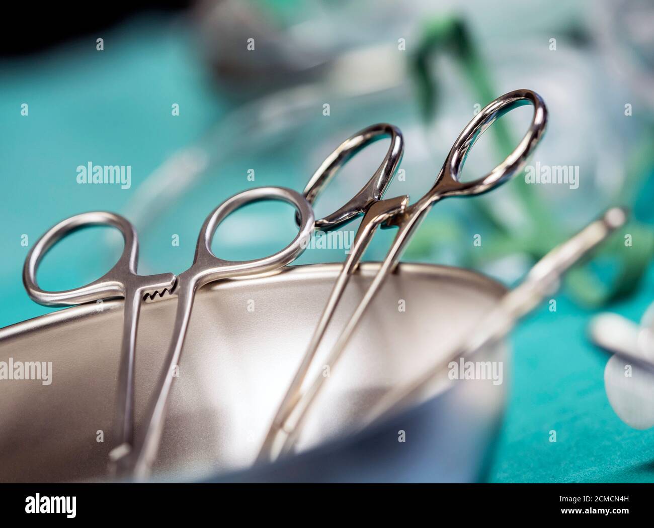 Some scissors for surgery on a tray, conceptual image Stock Photo