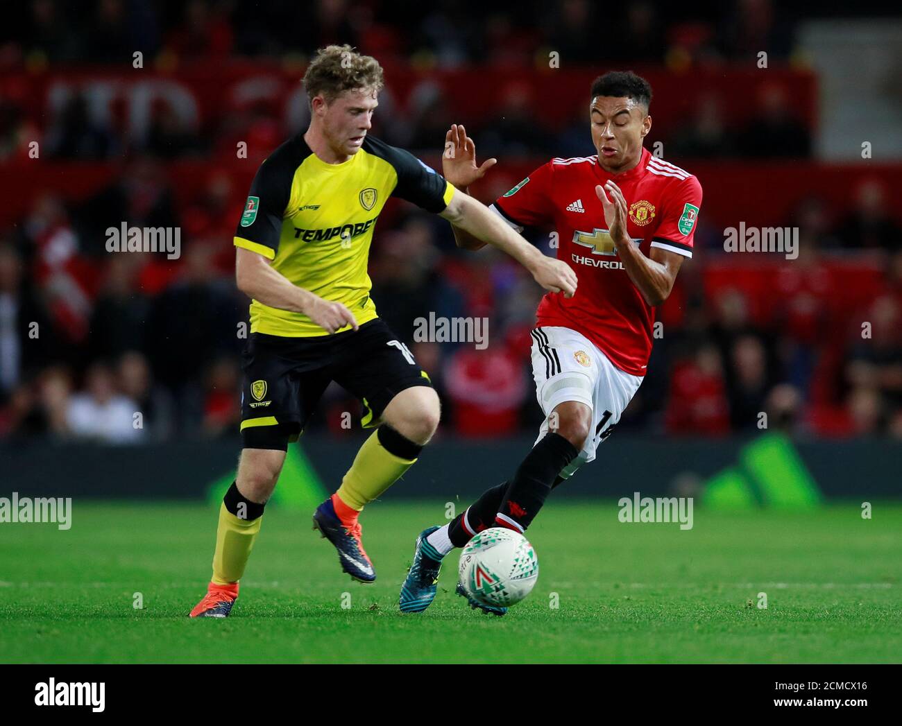 Soccer Football - Carabao Cup Third Round - Manchester United vs Burton  Albion - Old Trafford, Manchester, Britain - September 20, 2017 Manchester  United's Jesse Lingard in action with Burton Albion's Matt