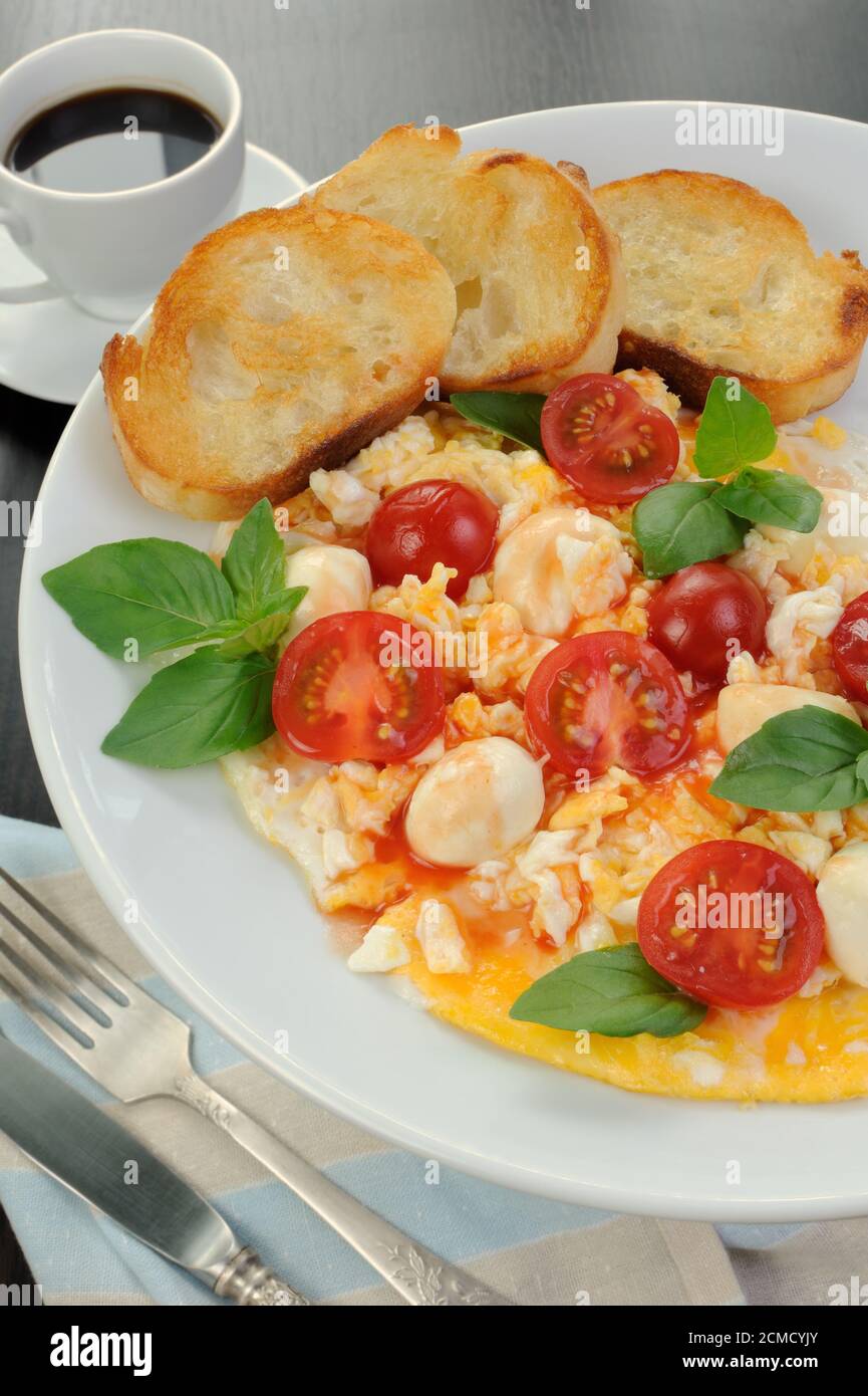 Scrambled eggs with mozzarella Stock Photo Alamy