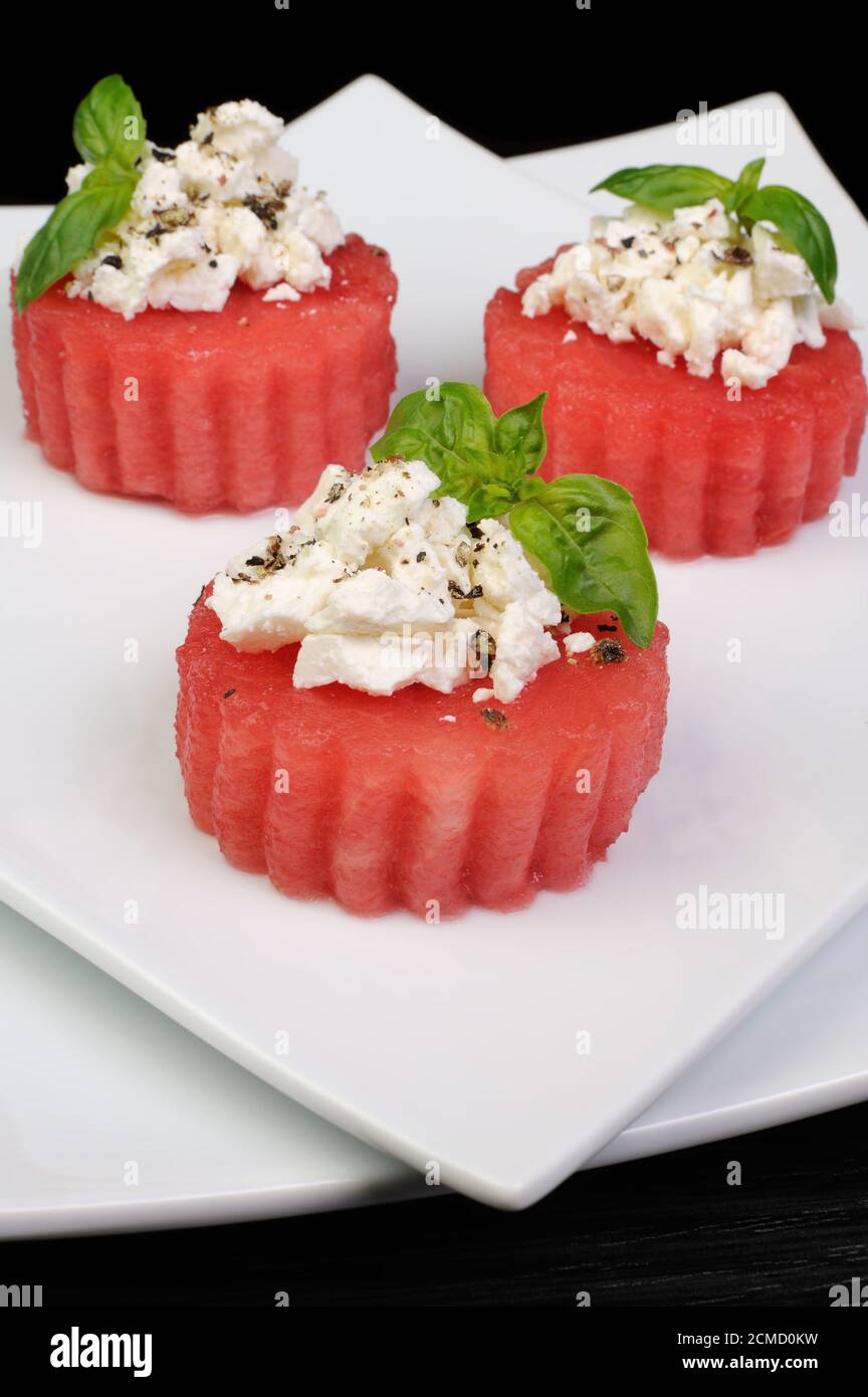 Appetizer of watermelon with ricotta Stock Photo Alamy
