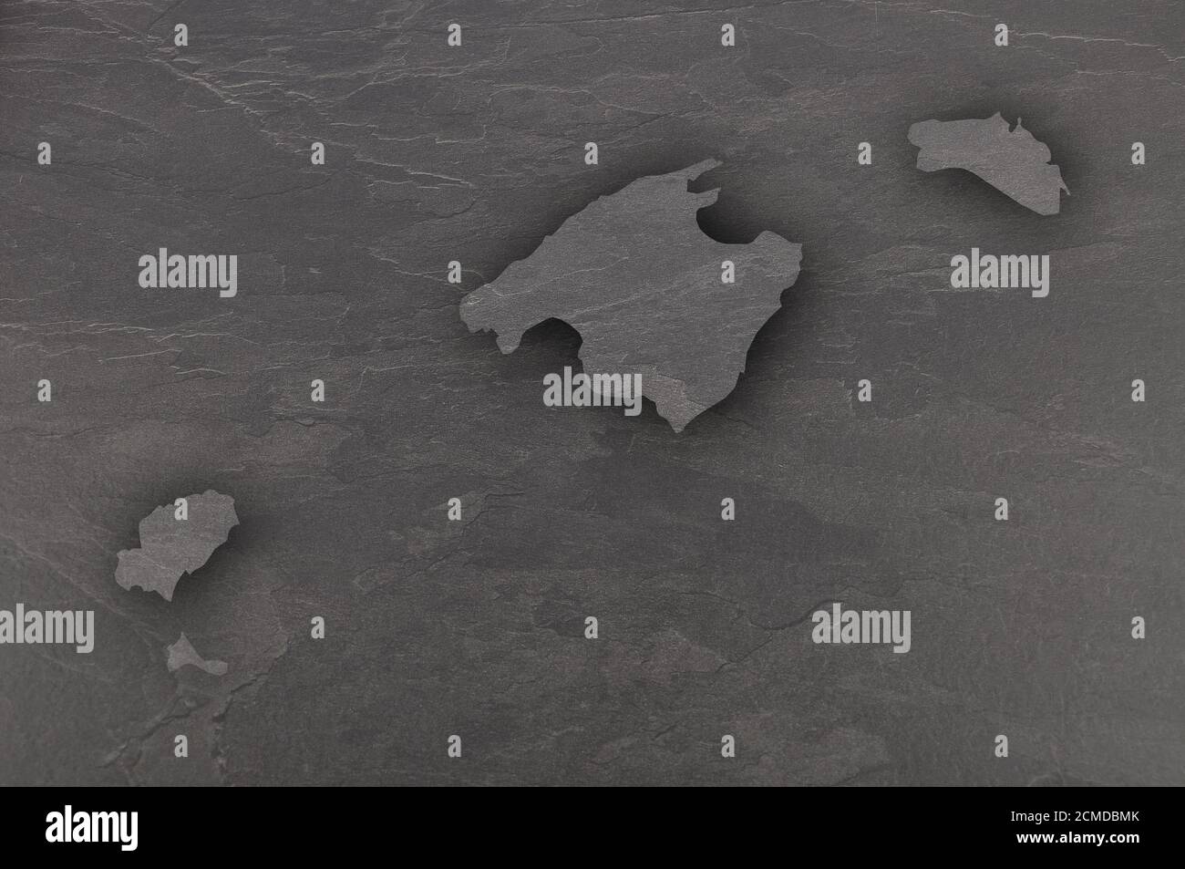 Map of Balearic Islands on dark slate Stock Photo - Alamy