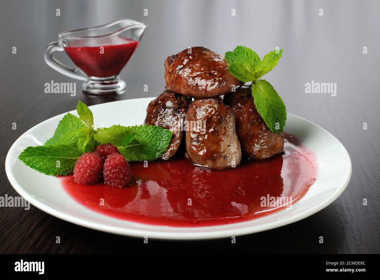 Chicken liver with raspberry sauce Stock Photo Alamy