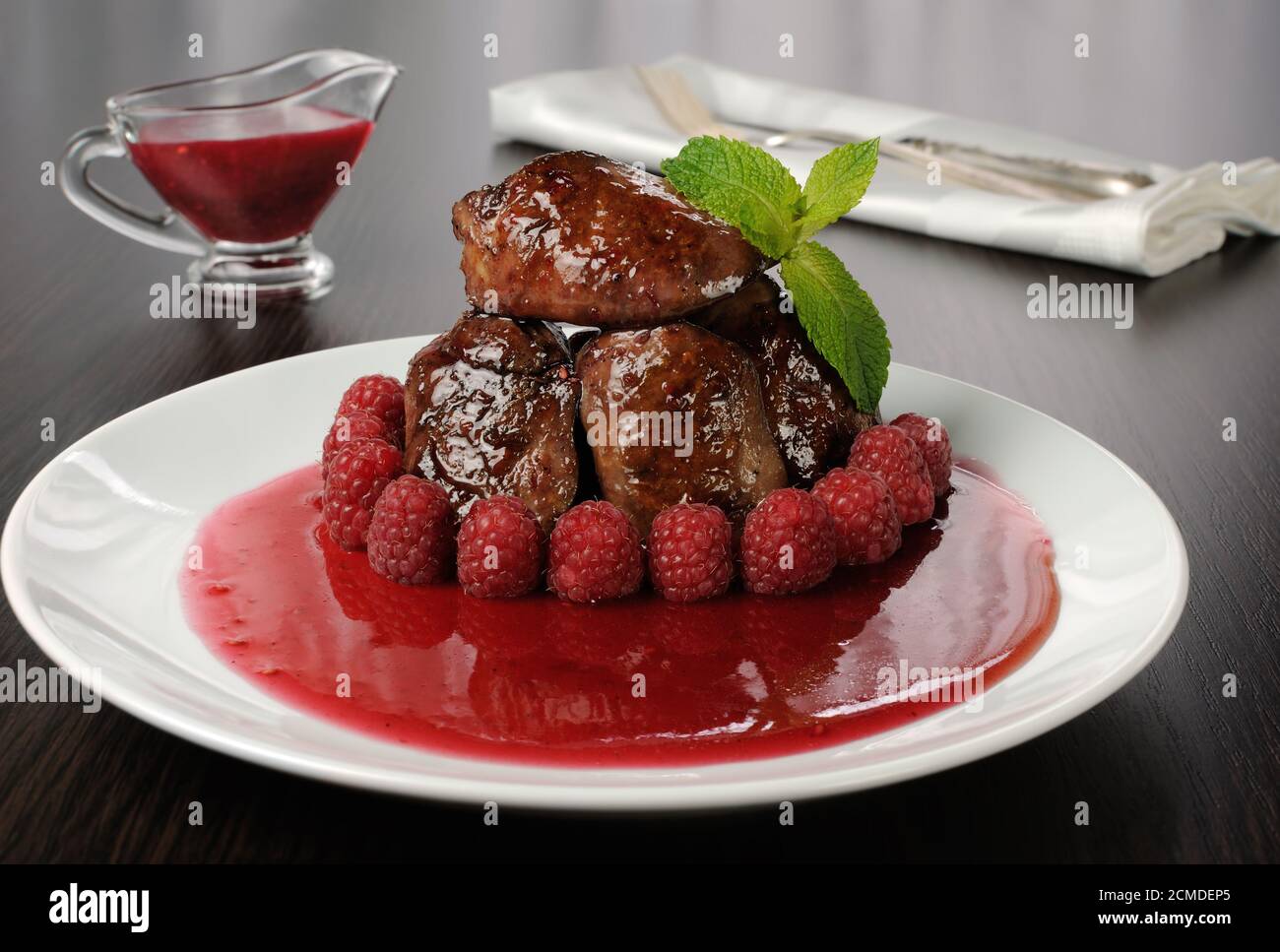 Chicken liver with raspberry sauce Stock Photo Alamy