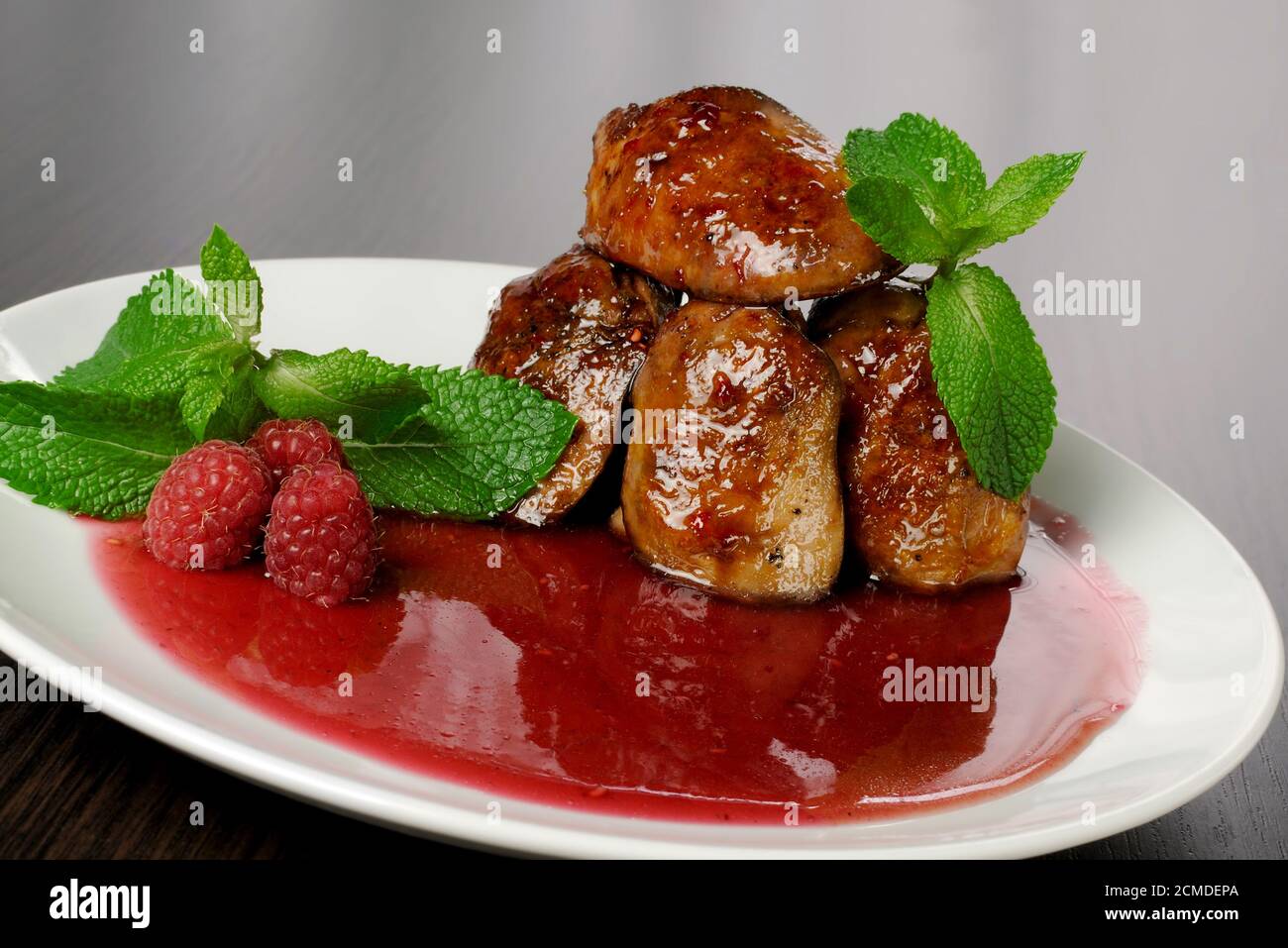 Chicken liver with raspberry sauce Stock Photo Alamy