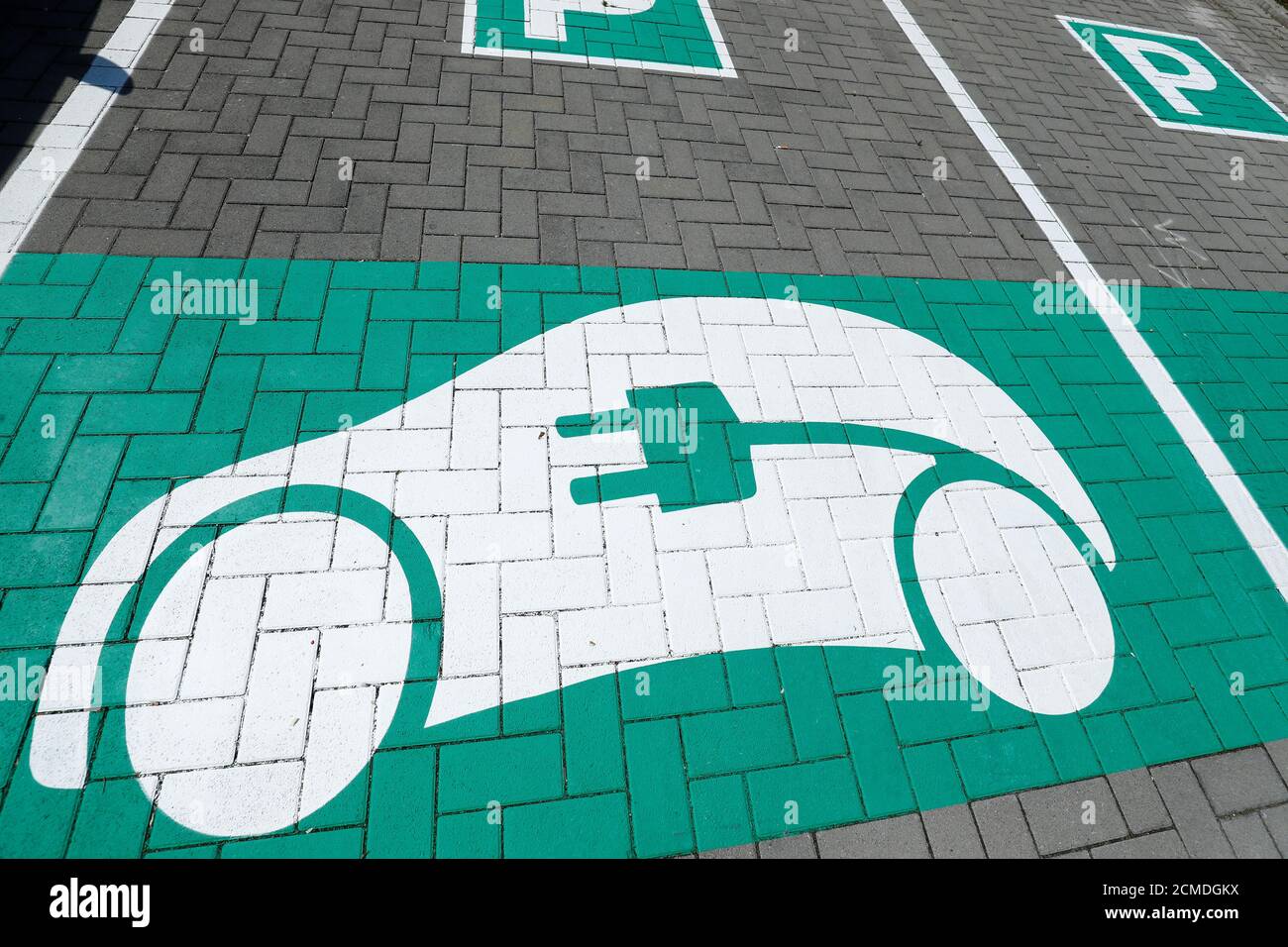 An electric vehicle charging station of municipal utilities 'Stadtwerke Ruesselsheim' is pictured in Ruesselsheim, Germany, May 23, 2019. Picture taken May 23, 2019.  REUTERS/Ralph Orlowski Stock Photo