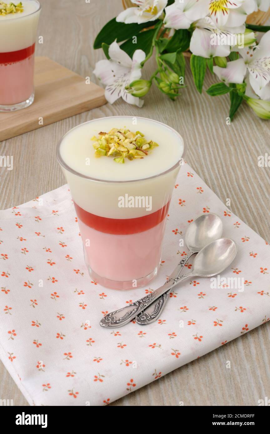 Strawberry yogurt dessert with pistachios Stock Photo Alamy