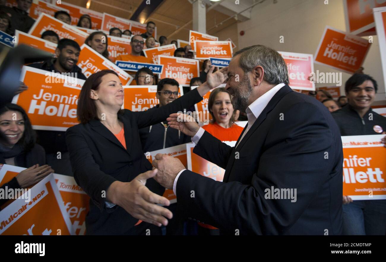 Canada's New Democratic Party (NDP) leader Tom Mulcair is greeted by candidate Jennifer Hollett at a campaign event in Toronto, Ontario, Canada, October 18, 2015. Canadians will go to the polls for a federal election on October 19. REUTERS/Jim Young Stock Photo