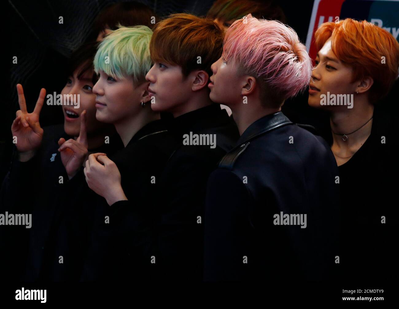 Members Of South Korean K Pop Band Bts React On The Red Carpet During 2015 Mnet Asian Music Awards Mama In Hong Kong China December 2 2015 Reuters Bobby Yip Stock Photo Alamy