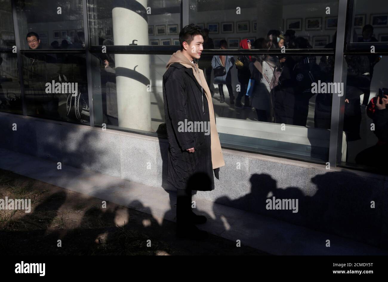 A student poses for the media after his preliminary examination at Beijing Film Academy in Beijing, China February 8, 2017. REUTERS/Jason Lee Stock Photo