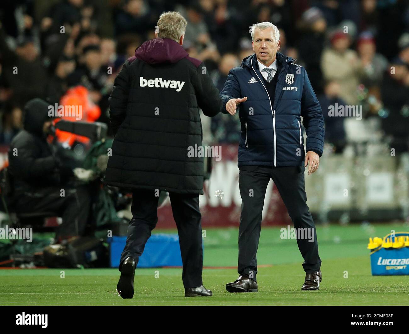 Soccer Football - Premier League - West Ham United vs West Bromwich Albion - London Stadium, London, Britain - January 2, 2018   West Bromwich Albion manager Alan Pardew and West Ham United manager David Moyes after the match    REUTERS/Eddie Keogh    EDITORIAL USE ONLY. No use with unauthorized audio, video, data, fixture lists, club/league logos or 'live' services. Online in-match use limited to 75 images, no video emulation. No use in betting, games or single club/league/player publications.  Please contact your account representative for further details. Stock Photo